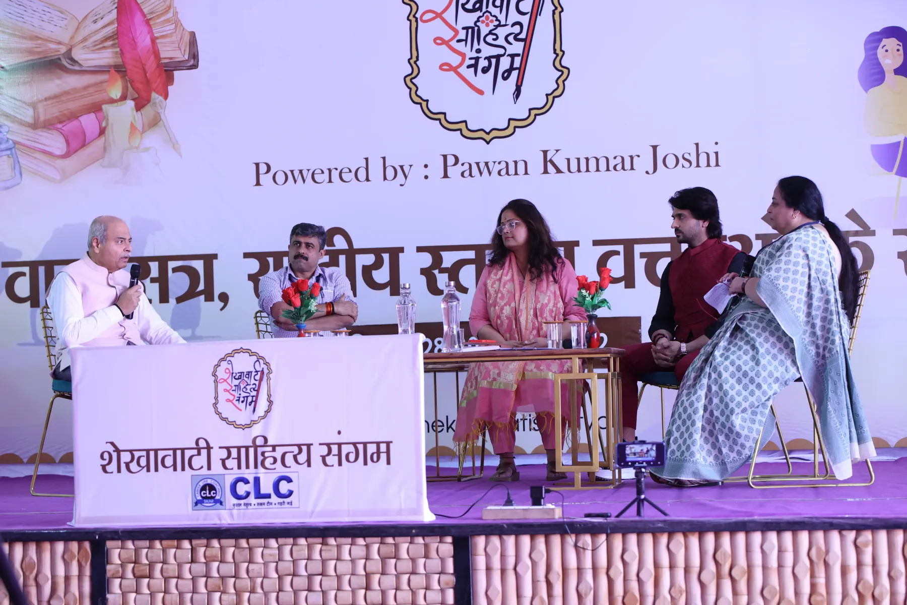 Press and media at a Sangam session
